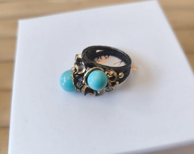 Silver ring with natural turquoises and white topazes