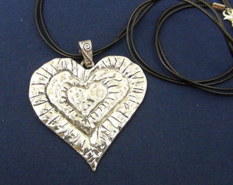 Large Heart Pendant Necklace: Silver Plated Alloy, Black Cord