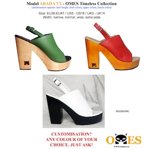 May include: Three pairs of women's platform sandals with different colored uppers: green, red, and white. The sandals have a wooden platform and heel. The text "Model ABADA V2 - OMES Timeless Collection" is at the top of the image. The text "CUSTOMISATION? ANY COLOUR OF YOUR CHOICE. JUST ASK!" is at the bottom of the image. The text "WEDDING" is in the upper right corner of the image. The text "OMES" is in the lower right corner of the image.