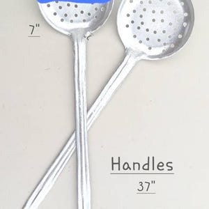 West African Traditional Hand-made spatula for turning and frying.