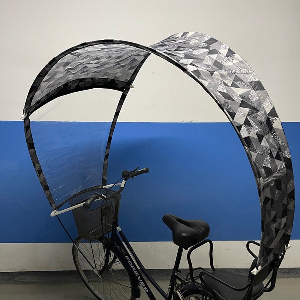 Parapluie vélo homme et femme flexible et ultra léger avec motifs géométriques en nuances de gris, contre la pluie et le vent