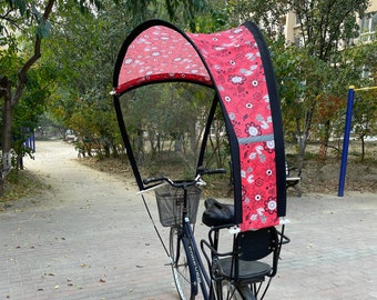 Bicycle rain cape that anticipates climate change and protects both the cyclist and the environment