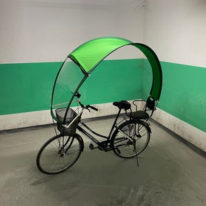 Copertura antipioggia ecologica per city bike da uomo e da donna