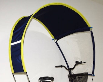 Two-tone aerodynamic profiled umbrella for all types of cycles, against rain, sun and wind