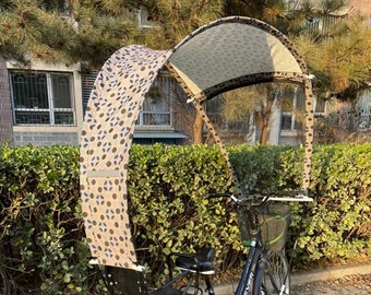 Chic bicycle umbrella with gold patterns and reflective stripes for pedaling in the rain with grace and elegance