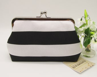 leather striped clutch bag