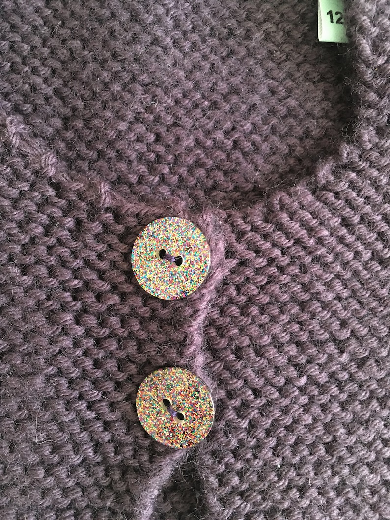 Baby cardigan made of worsted polyamide and short sleeves plum color