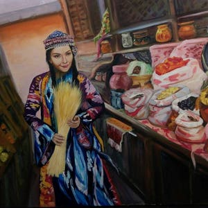 May include: A woman in a colorful traditional dress holds a bundle of wheat in a market setting. The market is filled with various goods, including produce, spices, and dried fruits. The woman's dress is adorned with intricate patterns and embroidery.
