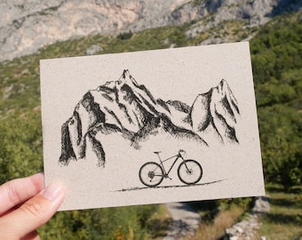 Postcard grass paper mountains and bike