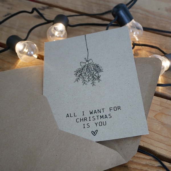 Tarjeta navideña "Lo único que quiero para Navidad eres tú", hecha de papel de hierba.