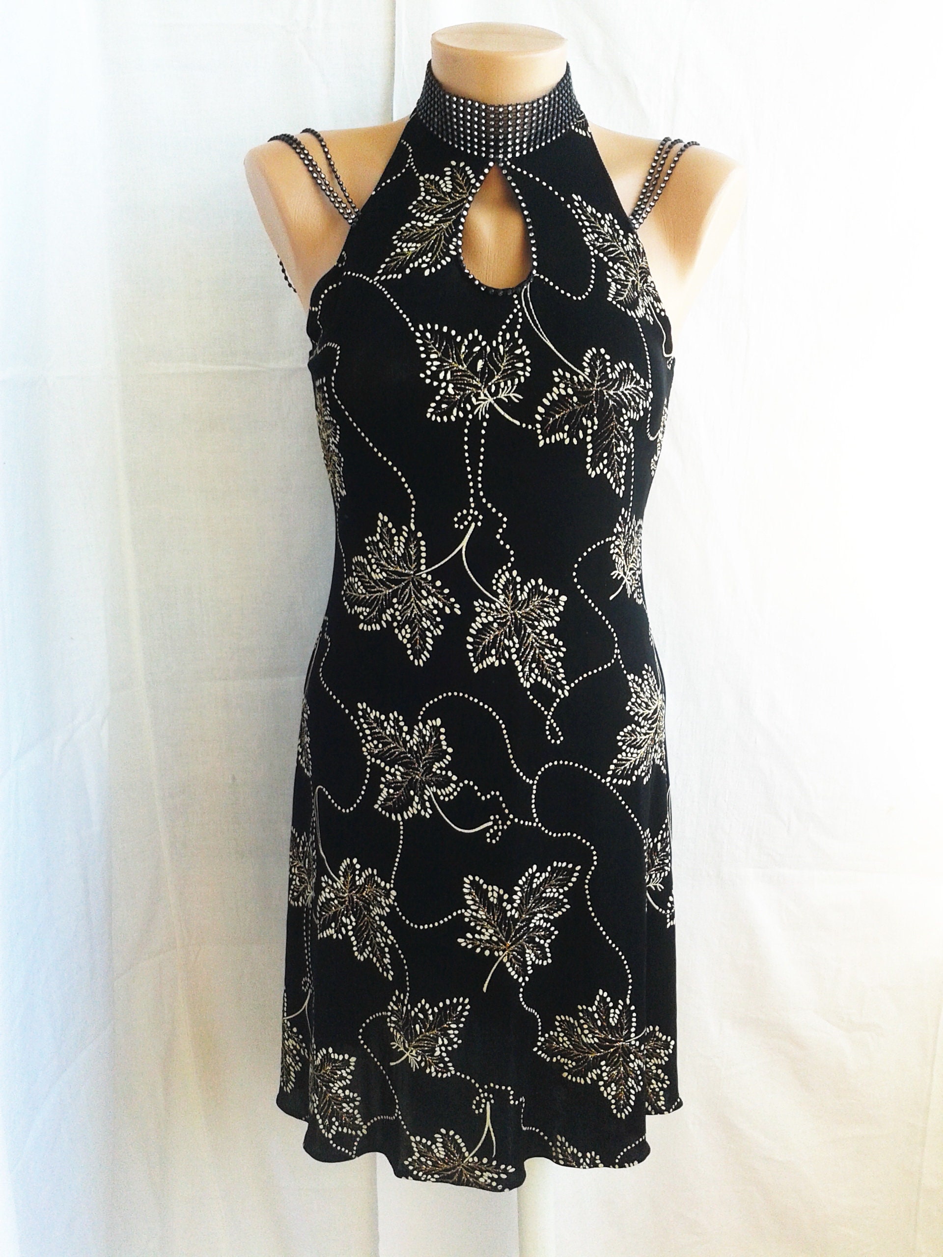 black dress with gold leaves