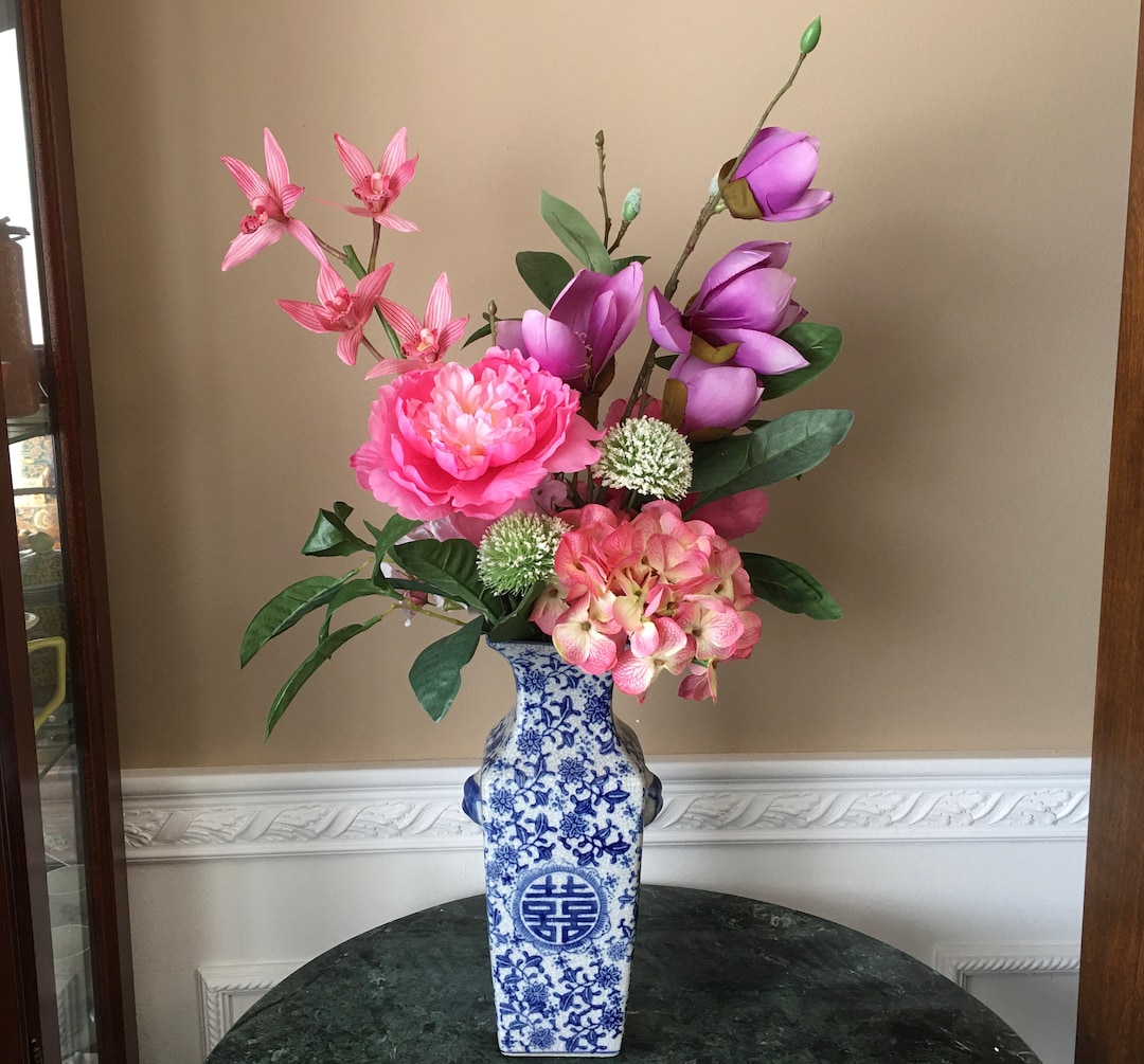 Chinese Blue and White Double Happiness Vase With Artificial White, Purple and Pink Flowers