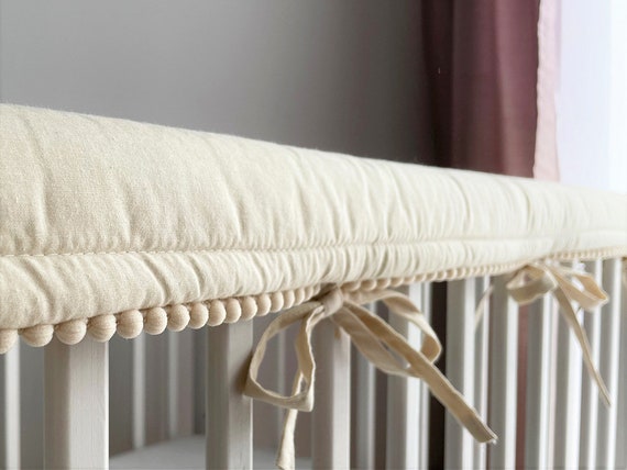 Crib railing clearance protector