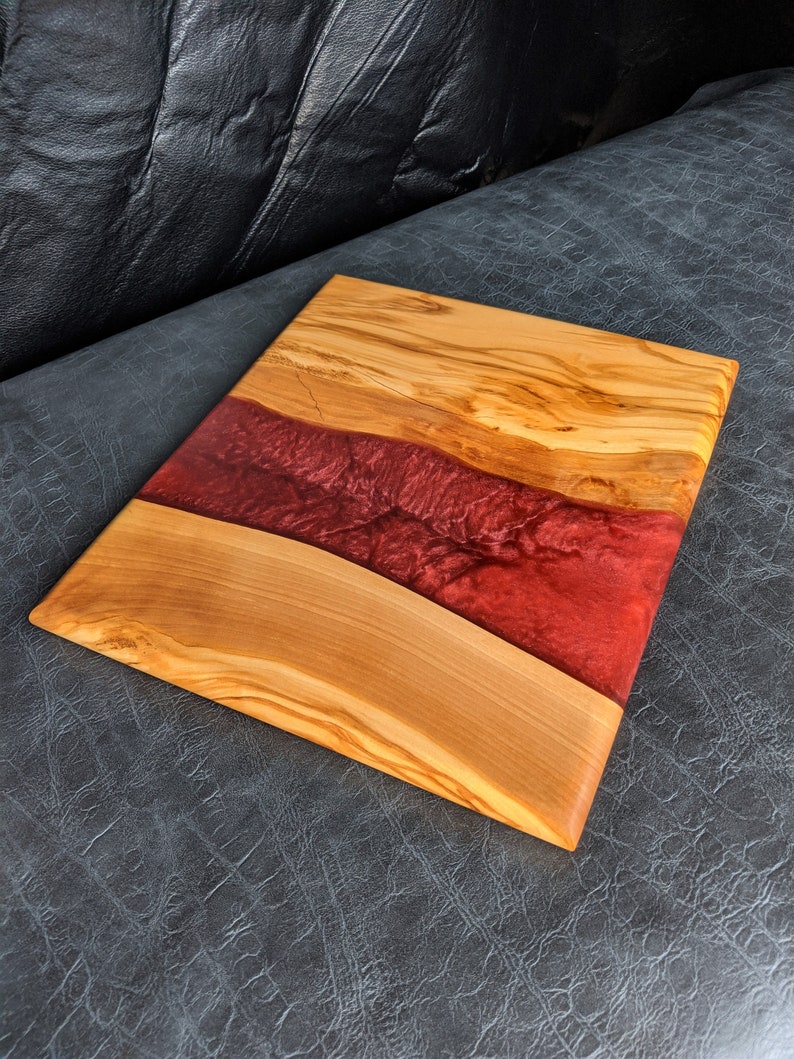 Live Edge Olive Wood and Red Epoxy River Charcuterie Board