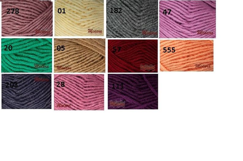 May include: A collection of yarn skeins in various colors, including shades of pink, green, gray, and orange. Each skein is labeled with a number, such as 278, 01, and 182. The yarn appears to be soft and suitable for knitting or crochet projects.