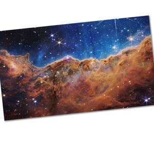 Cosmic Cliffs in the Carina Nebula from NASA’s James Webb Space Telescope Poster Print
