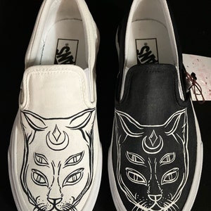 Custom mystic cat slip on vans.