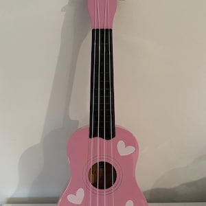 Gepersonaliseerde speelgoedgitaar