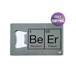 May include: A silver metal bottle opener with a cut-out design in the shape of a bottle opener. The opener has the chemical symbols and names for Beryllium (Be) and Erbium (Er) printed on it.