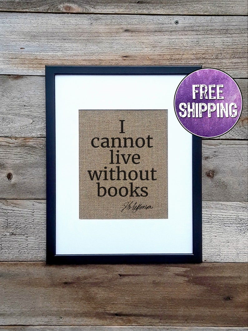 Thomas Jefferson Quote I cannot live without books  with his signature underneath. The black graphic is featured on brown burlap