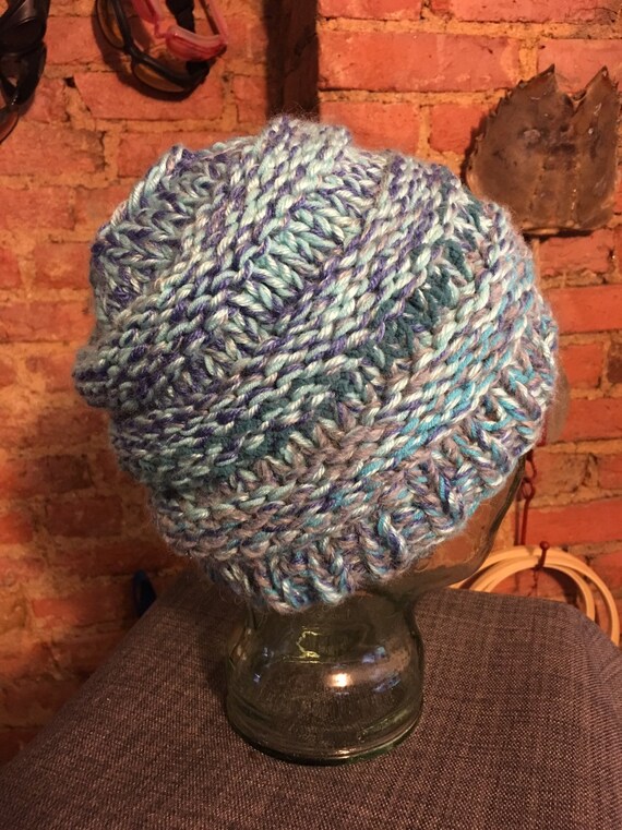 Pontail messy bun handknitted hat beanie toque cream and mixed blues