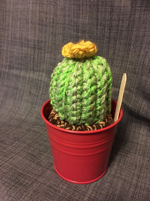 Handmade crocheted cactus with yellow flower 8" high