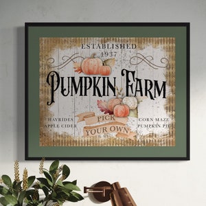 Puede incluir: Un cartel vintage enmarcado con el texto "Establecido en 1937 Pumpkin Farm" en letras negras sobre un fondo de madera blanca. El cartel presenta un tema otoñal con calabazas, hojas y el texto "Elige tu propio" en una pancarta.