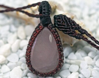 Teardrop rose quartz macrame necklace with reddish brown cord.