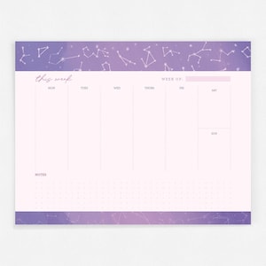 May include: A weekly planner with a purple and pink gradient background featuring a constellation pattern. The planner has a section for each day of the week, a notes section, and a space to write the week number. The text "This Week" is written at the top of the planner.
