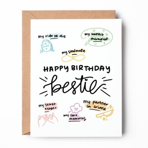 May include: A white card with a colorful illustration of a birthday card for a best friend. The card says "Happy Birthday bestie" and includes phrases like "my ride or die", "my soulmate", "my secret keeper", "my partner in crime", and "my core memories".
