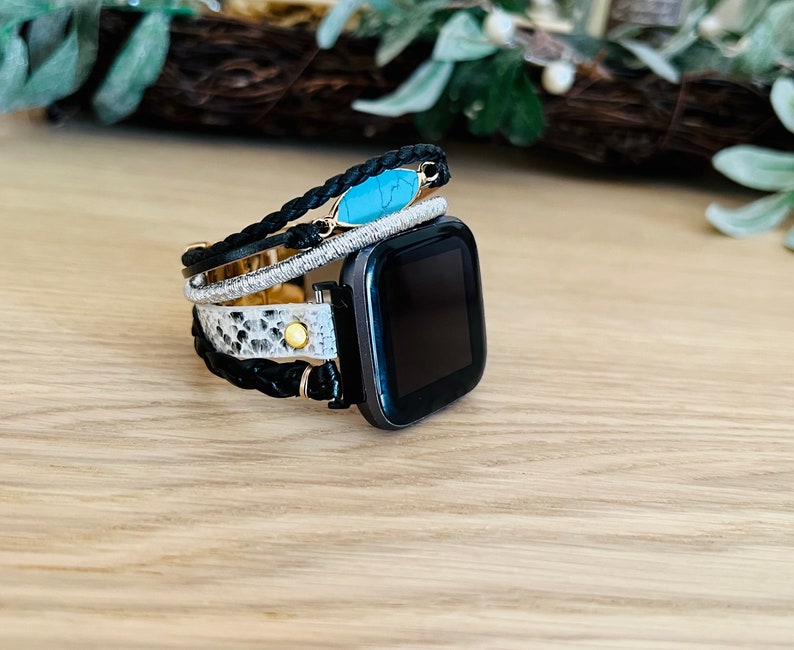 dressy boho chic fitbit versa band. layered white snake skin print black braided strap wristband for fitbit versa watch