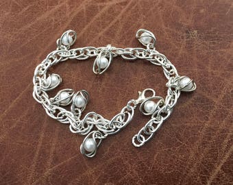 8.5" silver plated chain bracelet with faux caged pearls