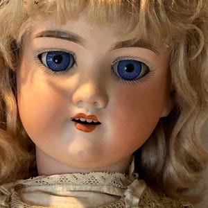 Antique ACM Doll