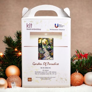 May include: A white box kit for bead embroidery, with a picture of a garden path. The box is labelled "Garden Of Paradise" and includes details about the number of colours and stitch count. The completed piece size is 45 x 67 cm.