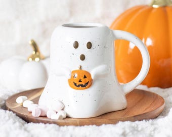 Ghost shaped mug with pumpkin