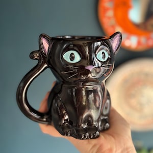 Cute and Creepy Black Cat Mug