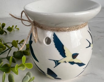 Swallows flying wax/oil burner tea light powered