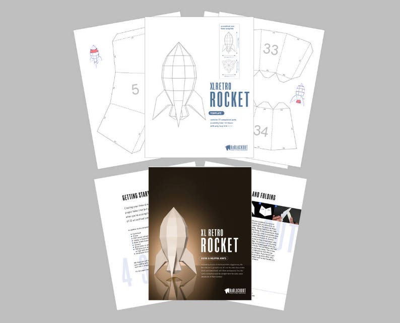 May include: A paper model kit for building a large retro rocket. The kit includes instructions and templates for cutting and folding the paper to create a 3D model. The rocket is white with red and blue accents. The kit is titled "XL Retro Rocket".