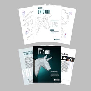 May include: A set of instructions for building a papercraft winter unicorn. The instructions include a template, custom guidelines, and folding instructions. The unicorn is white with a blue horn and is shown in a 3D rendering on the cover.