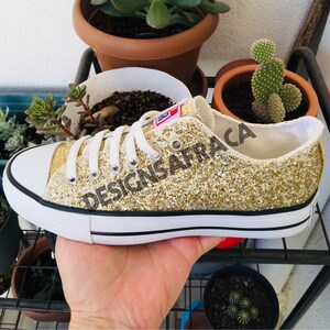 Zapatillas converse doradas top