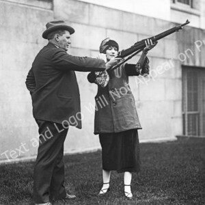 1924 Man Teaching a Woman How to Hold a Rifle Vintage Old Photo Art Print - - Historic Scene --