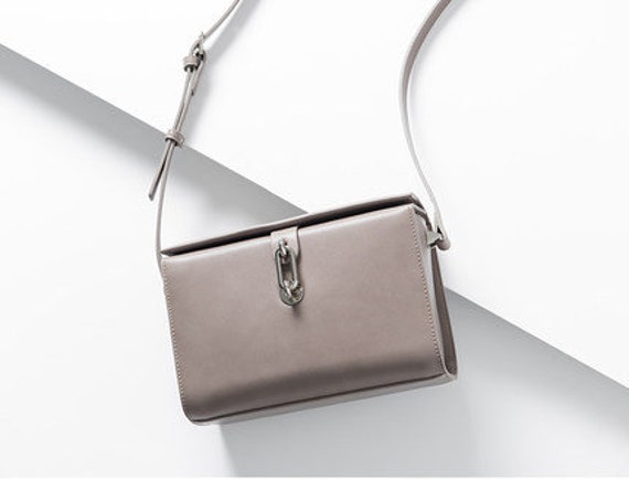 luxury bags that fit laptop