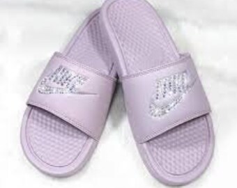 light purple nike slides