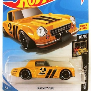 Hot wheels fairlady 2000 yellow outlet