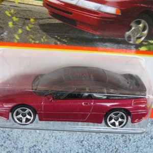 Matchbox Subaru SVX 88/100 Die-Cast Car - Red With Flashing Light Feature