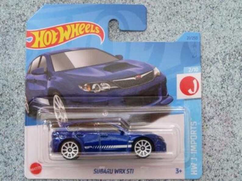 Cochecito Hot Wheels Subaru WRX STI - HW J-Imports 2/10, Tarjeta Corta, Color Azul Oscuro, Mattel 2023