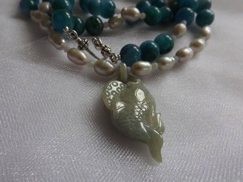 Necklace. JADE FISH PENDANT Blue and Green Apatite Beads Silvery Freshwater Pearls White Glass Faceted Beads