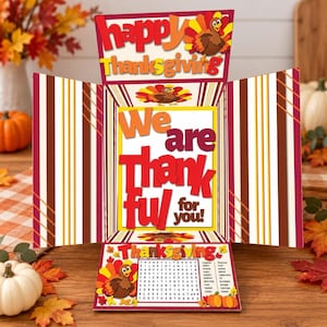 May include: A multi-panel Thanksgiving card featuring a cartoon turkey and the text "happy Thanksgiving" at the top, "We are Thankful for you!" in the center, and a word search puzzle with the word "Thanksgiving" at the bottom panel.