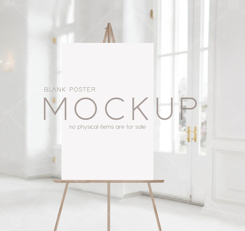 May include: A white poster mockup on a wooden easel in a white room with a white door. The poster says "BLANK POSTER MOCKUP no physical items are for sale".