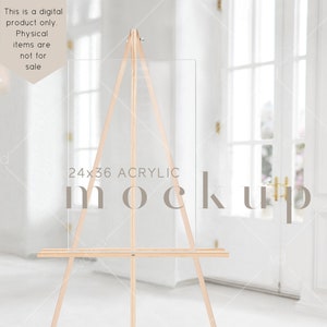 Op de afbeelding: Een mockup van een transparant acryl bord op een houten ezel. Het bord is 61 cm bij 91 cm en heeft de tekst "24x36 ACRYLIC mockup".